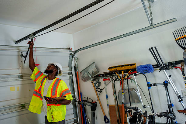 Professional Garage Door Panel Replacement technician working in Hudson County County, NJ